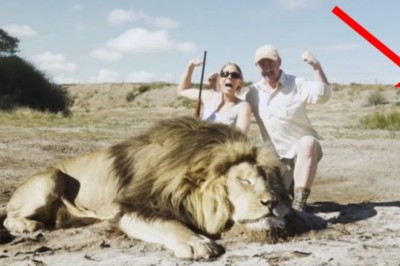 Dwoje myśliwych pozuje do 